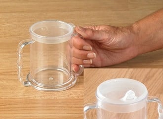 Transparent cup with 2 handles and 2 spouts